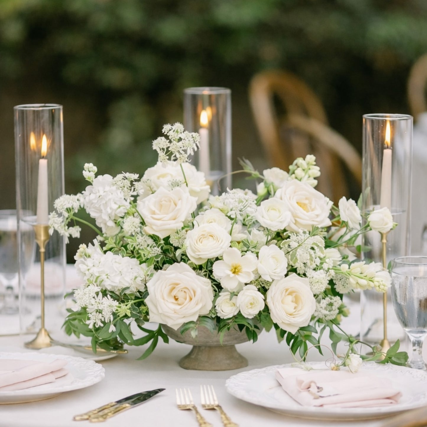 Porcelain Heirloom Compote Composition centerpiece with layered white garden roses and airy seasonal blooms arranged in classical footed compote bowl.