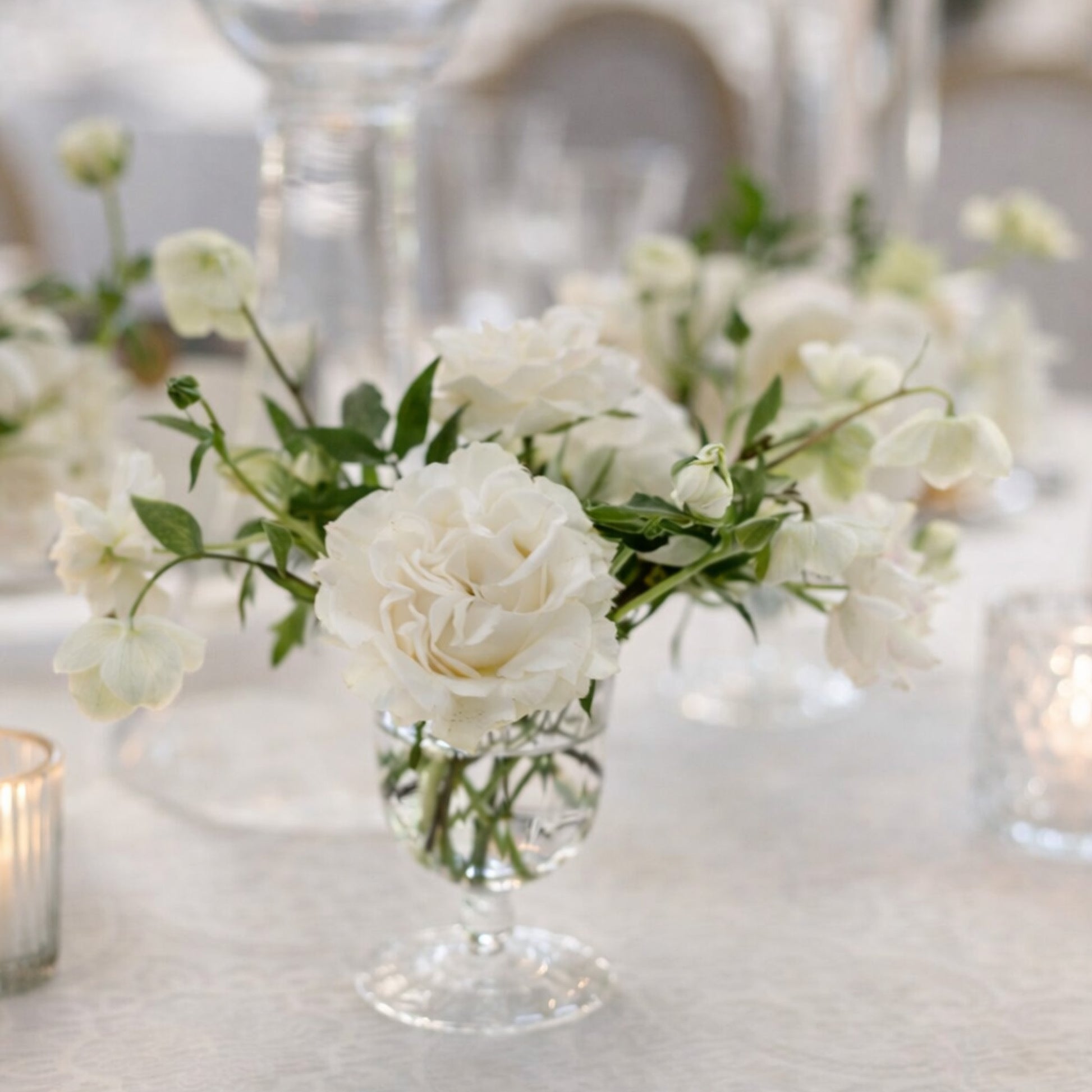 Porcelain Glass Compote Accent styled alongside candlelight and layered reception florals in soft white and neutral palette.
