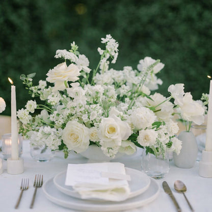 Porcelain large Still Life Vessel Composition with airy white garden blooms arranged in sculptural ceramic vessel centerpiece on elegant reception table.