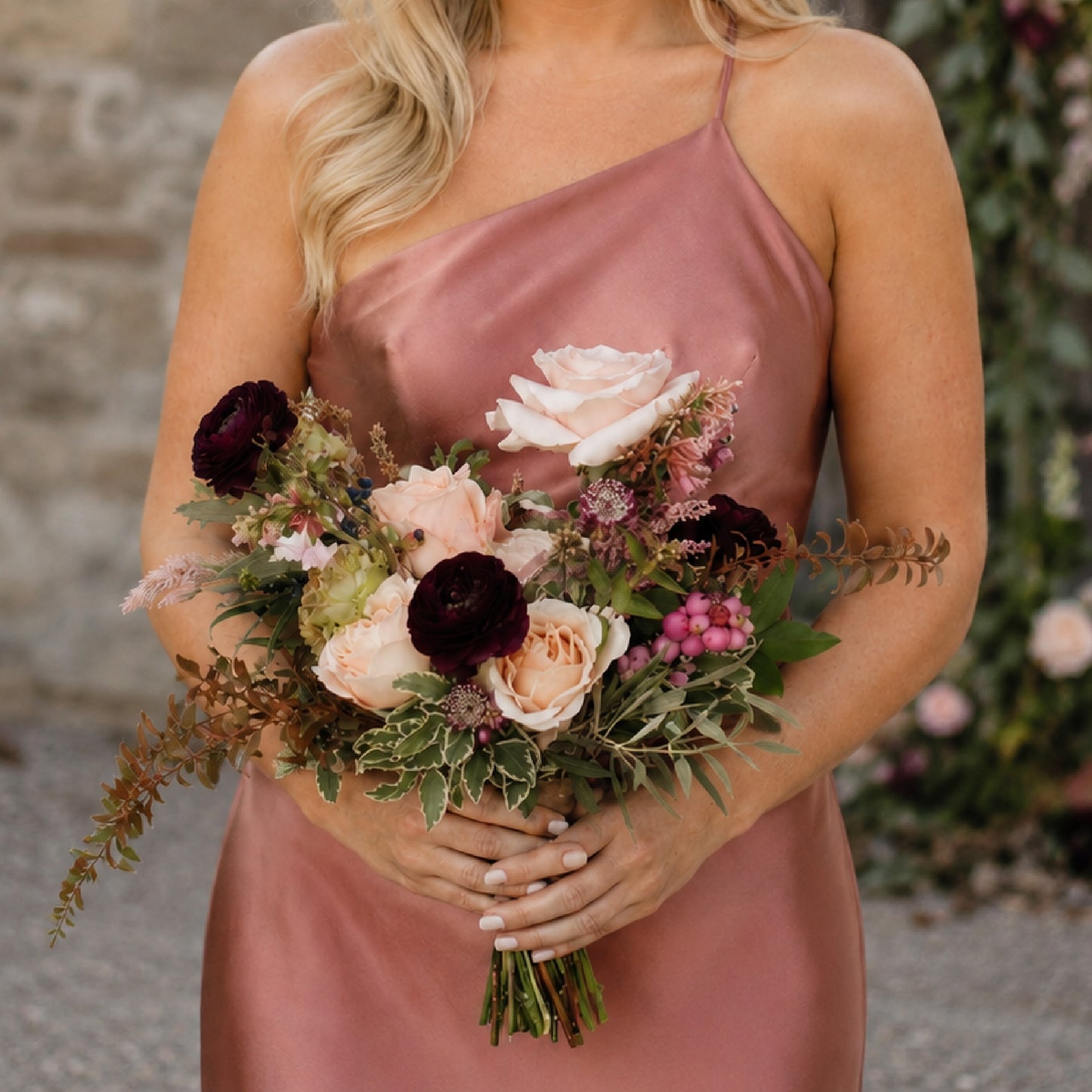 Moody burgundy and blush bridesmaid bouquet with romantic garden-style florals
